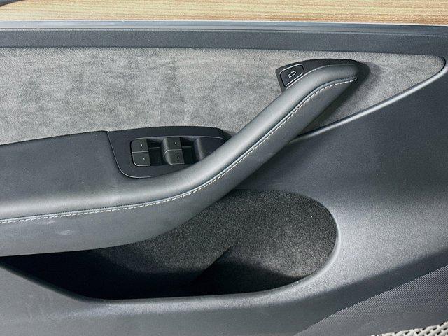 used 2024 Tesla Model Y car, priced at $33,397