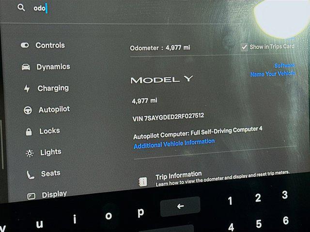 used 2024 Tesla Model Y car, priced at $33,397