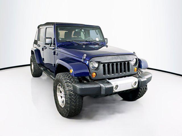 used 2013 Jeep Wrangler Unlimited car, priced at $18,989