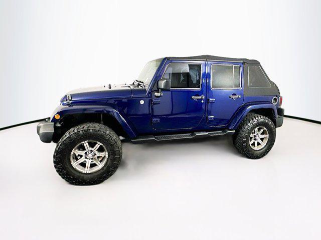 used 2013 Jeep Wrangler Unlimited car, priced at $18,989