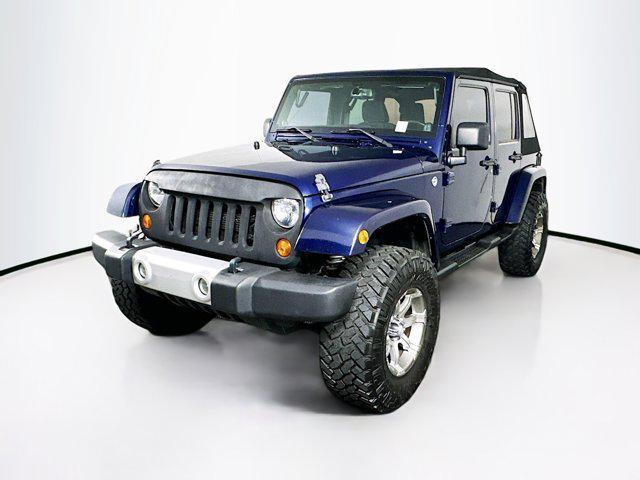 used 2013 Jeep Wrangler Unlimited car, priced at $18,989