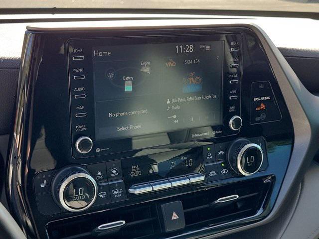 used 2020 Toyota Highlander Hybrid car, priced at $28,871