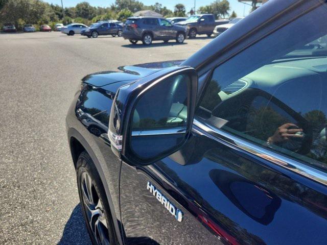 used 2020 Toyota Highlander Hybrid car, priced at $28,871