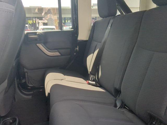 used 2014 Jeep Wrangler Unlimited car, priced at $19,997