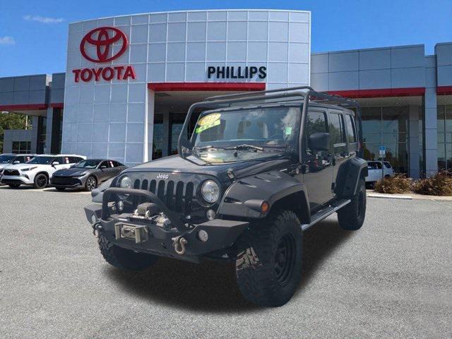 used 2014 Jeep Wrangler Unlimited car, priced at $19,997