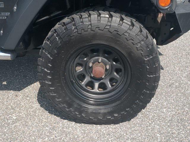 used 2014 Jeep Wrangler Unlimited car, priced at $19,997