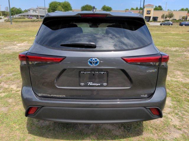 used 2021 Toyota Highlander Hybrid car, priced at $35,996