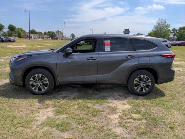 used 2021 Toyota Highlander Hybrid car, priced at $35,996