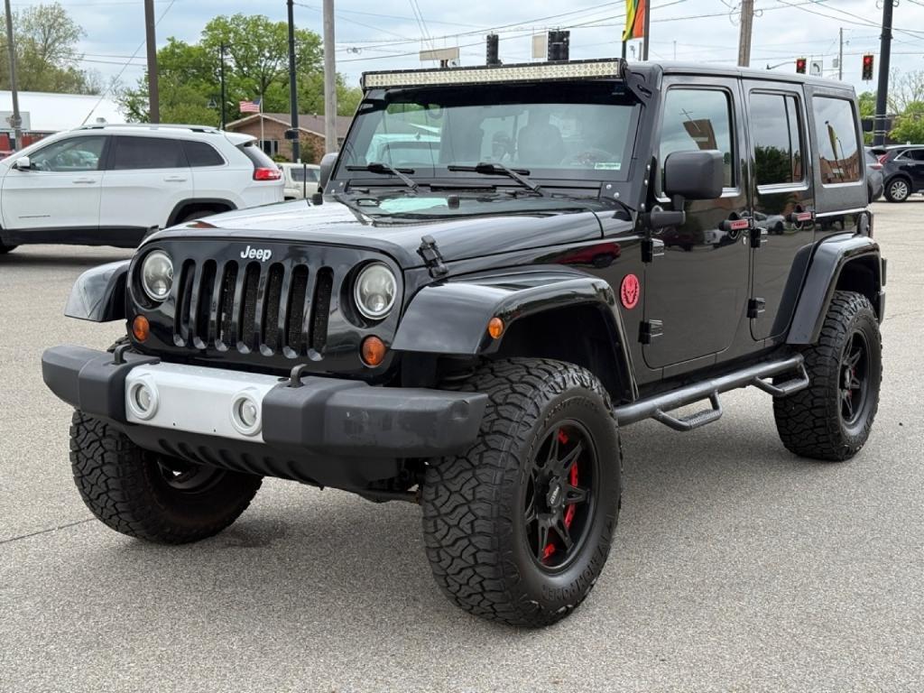 used 2012 Jeep Wrangler Unlimited car, priced at $15,588