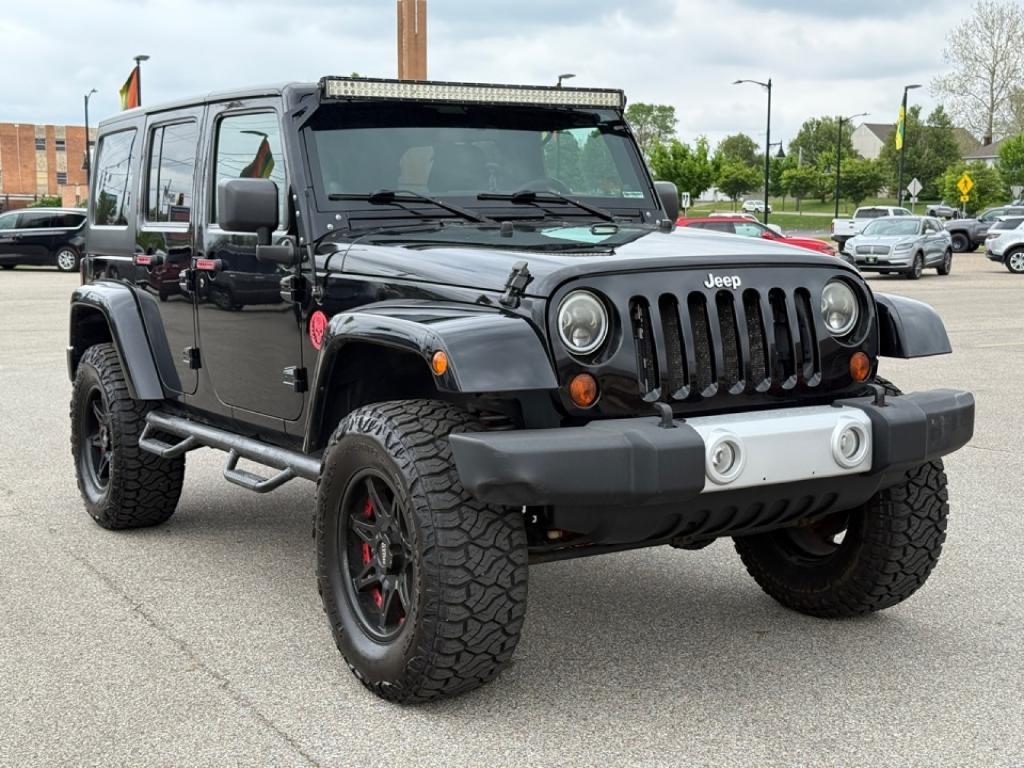 used 2012 Jeep Wrangler Unlimited car, priced at $15,588