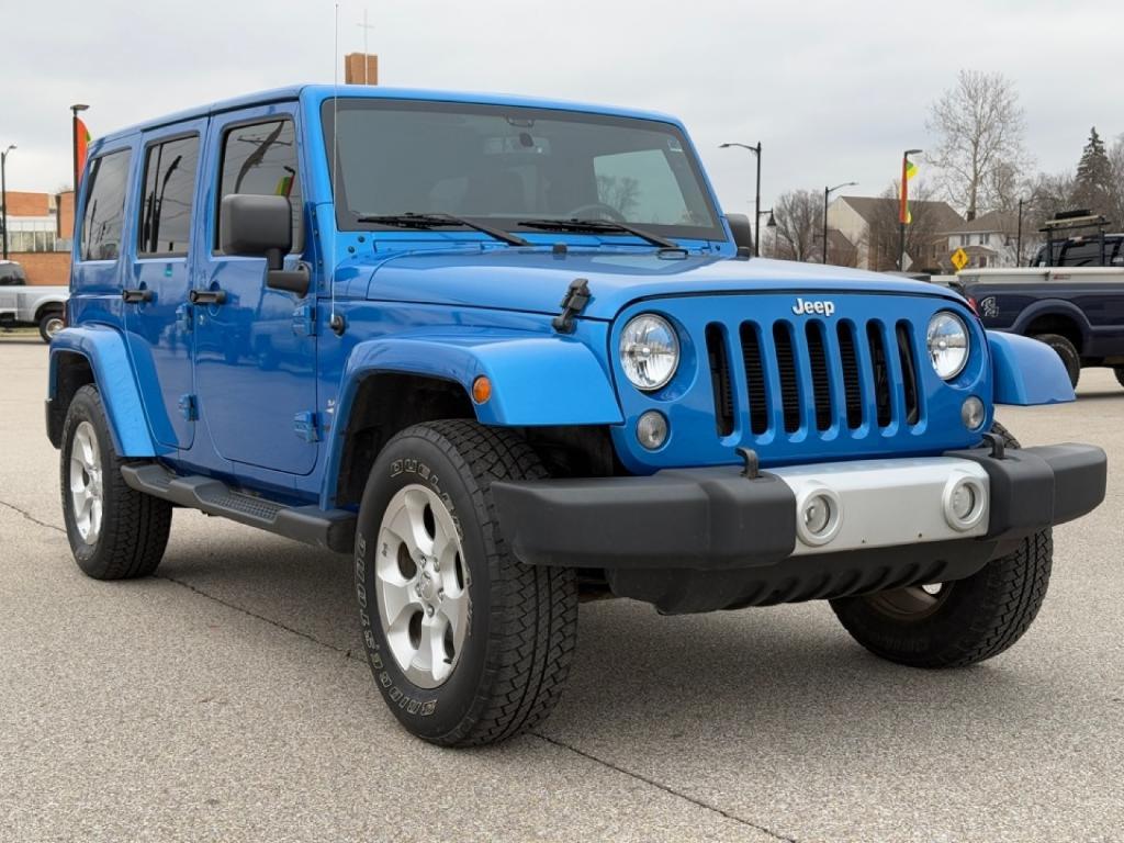 used 2015 Jeep Wrangler Unlimited car, priced at $21,355