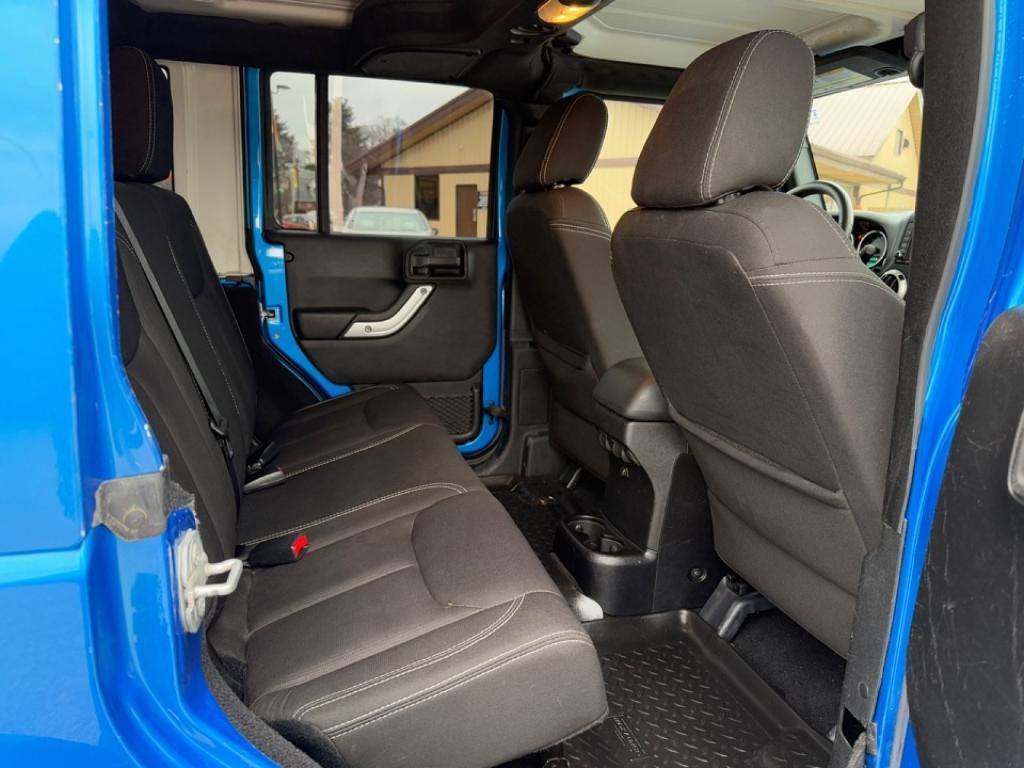 used 2015 Jeep Wrangler Unlimited car, priced at $21,355