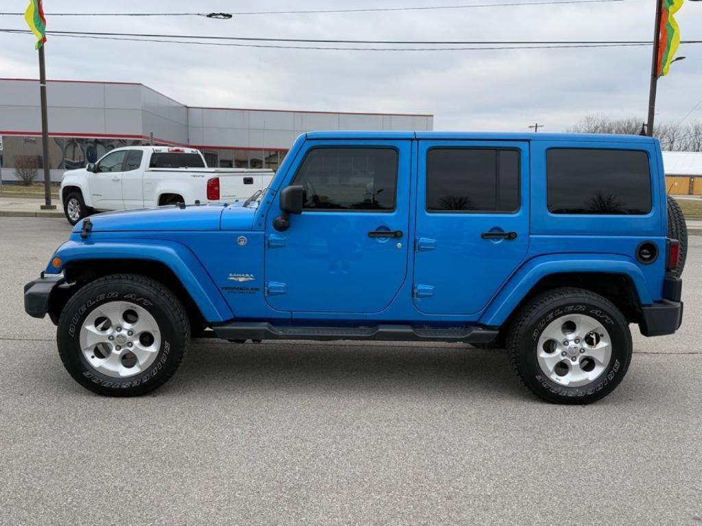 used 2015 Jeep Wrangler Unlimited car, priced at $21,355