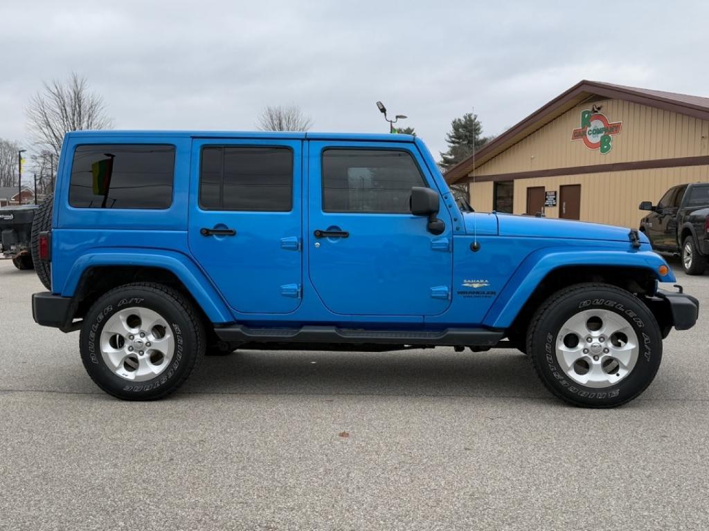 used 2015 Jeep Wrangler Unlimited car, priced at $21,355