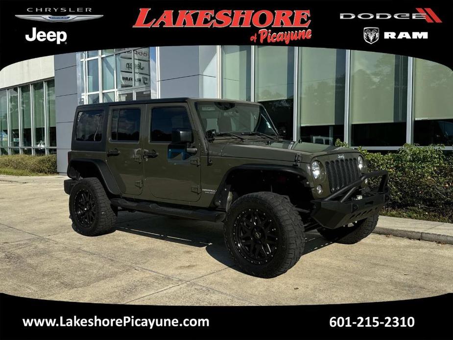 used 2015 Jeep Wrangler Unlimited car, priced at $20,998