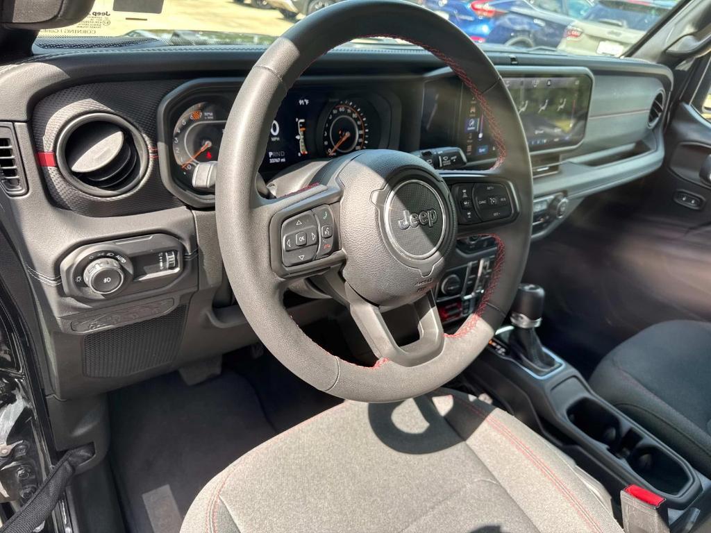 used 2024 Jeep Wrangler car, priced at $39,498