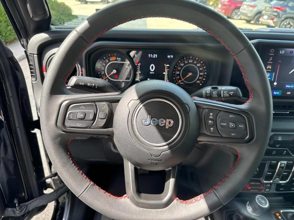 used 2024 Jeep Wrangler car, priced at $44,598