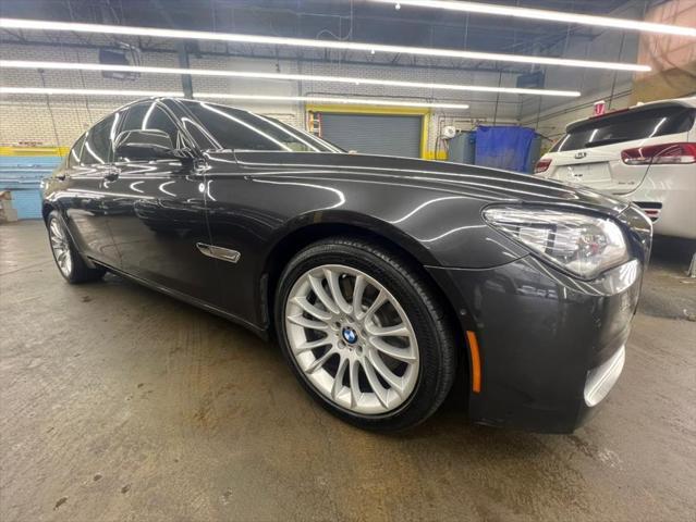 used 2015 BMW 750 car, priced at $16,588