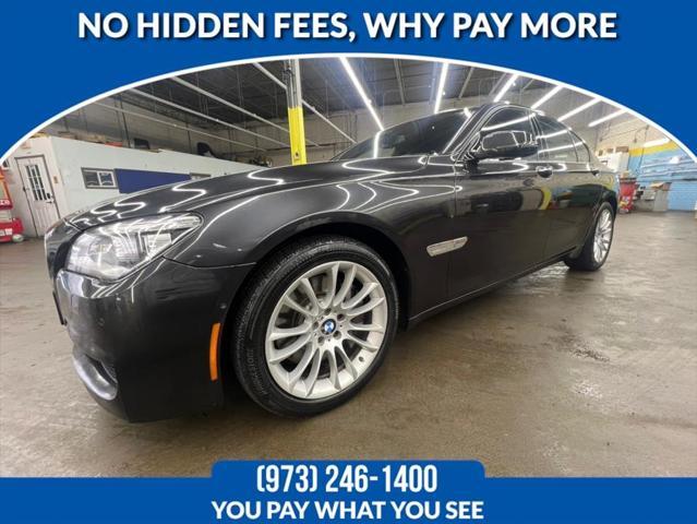 used 2015 BMW 750 car, priced at $16,588