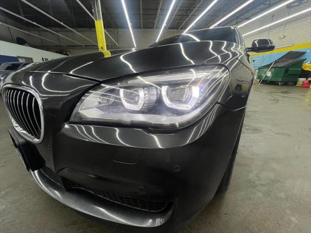 used 2015 BMW 750 car, priced at $16,588