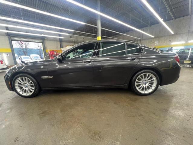 used 2015 BMW 750 car, priced at $16,588