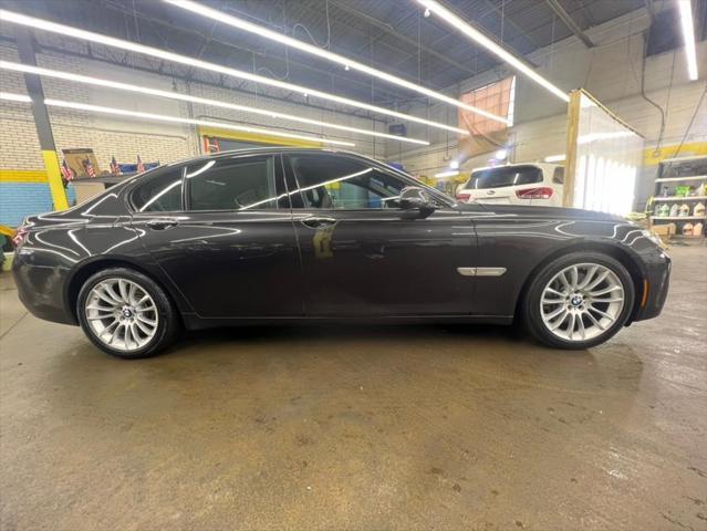 used 2015 BMW 750 car, priced at $16,588