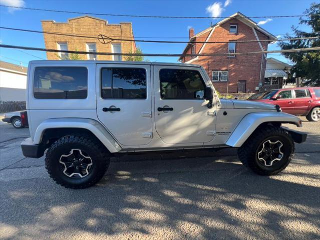 used 2011 Jeep Wrangler Unlimited car, priced at $10,988