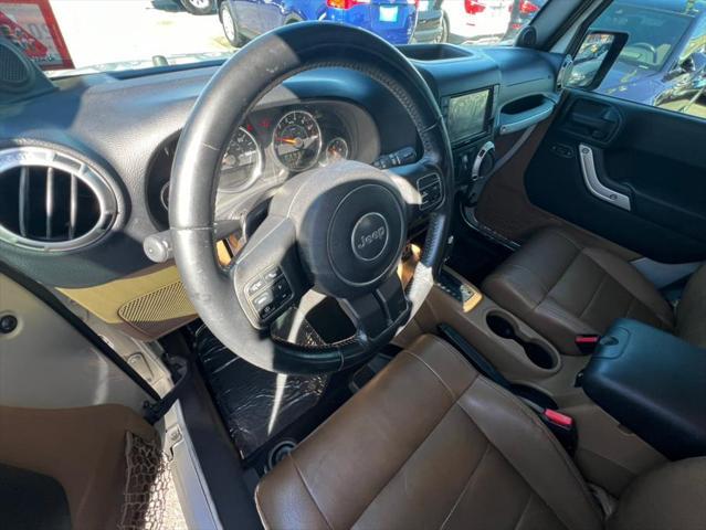used 2011 Jeep Wrangler Unlimited car, priced at $10,988