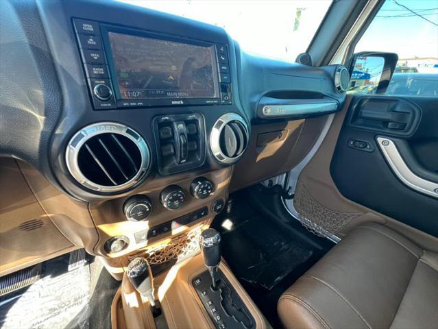 used 2011 Jeep Wrangler Unlimited car, priced at $10,988