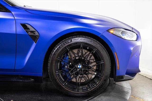 used 2024 BMW M4 car, priced at $85,995