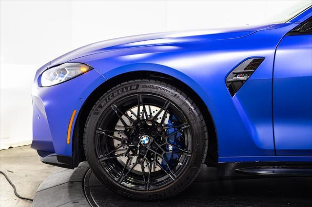 used 2024 BMW M4 car, priced at $85,995