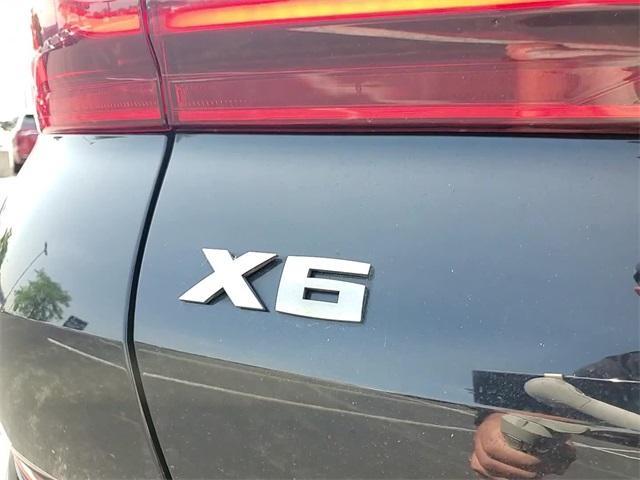 used 2023 BMW X6 car, priced at $67,688