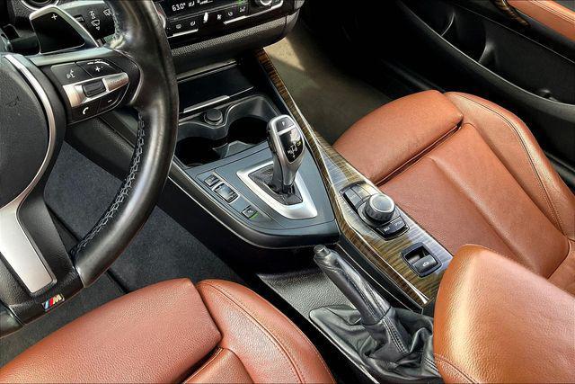 used 2016 BMW 228 car, priced at $9,000