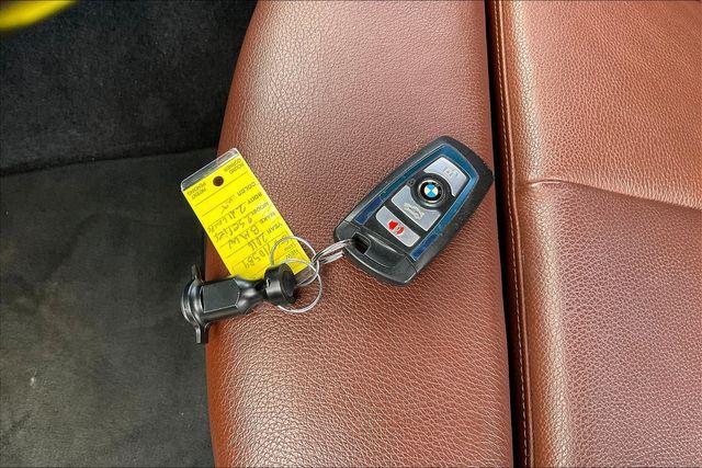 used 2016 BMW 228 car, priced at $9,000