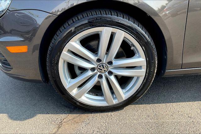 used 2014 Volkswagen Eos car, priced at $9,000