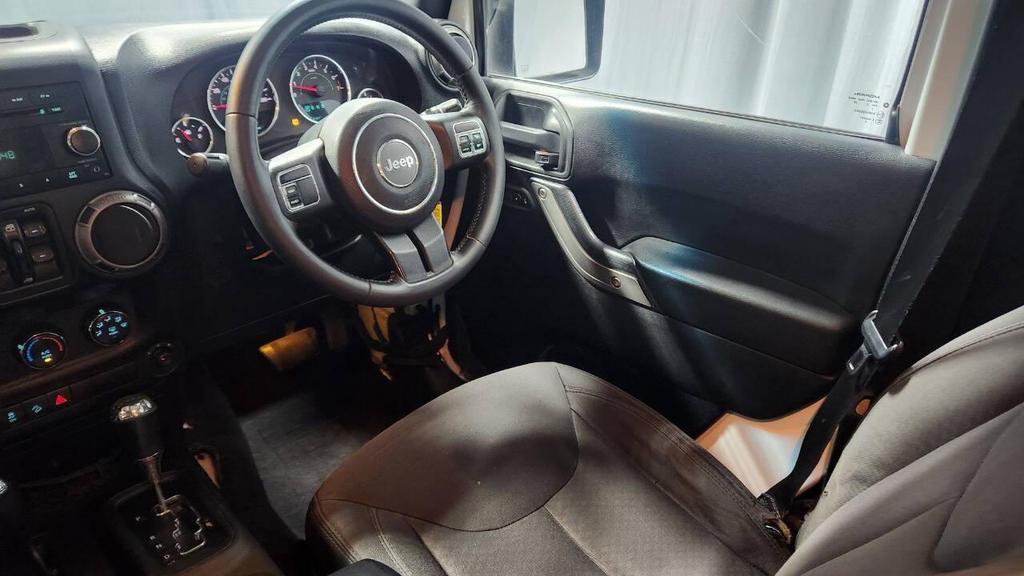 used 2015 Jeep Wrangler Unlimited car, priced at $15,995