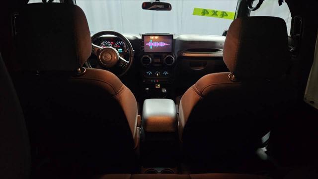 used 2014 Jeep Wrangler car, priced at $13,995
