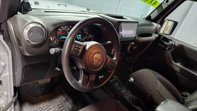 used 2014 Jeep Wrangler car, priced at $13,995