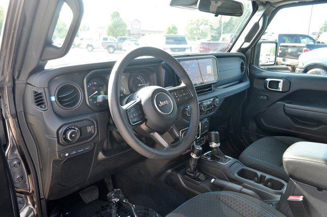 used 2024 Jeep Wrangler 4xe car, priced at $43,383