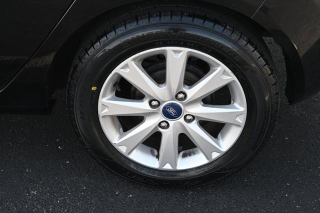 used 2012 Ford Fiesta car, priced at $6,000