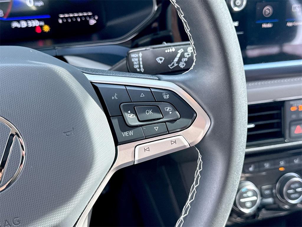 used 2024 Volkswagen Taos car, priced at $20,000