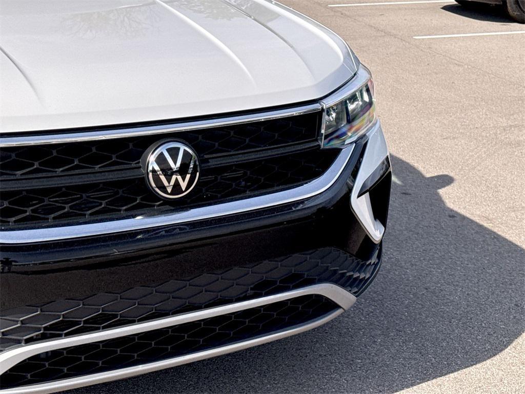 used 2024 Volkswagen Taos car, priced at $20,000