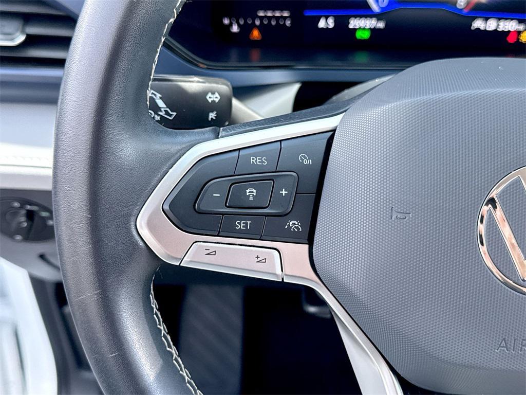 used 2024 Volkswagen Taos car, priced at $20,000