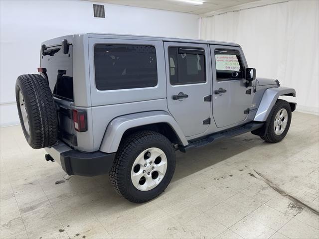 used 2013 Jeep Wrangler Unlimited car, priced at $16,986