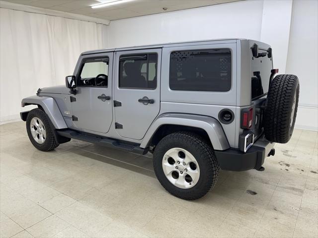 used 2013 Jeep Wrangler Unlimited car, priced at $16,986