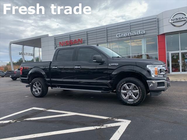 used 2019 Ford F-150 car, priced at $32,879