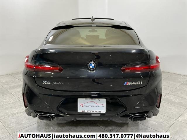 used 2022 BMW X4 car, priced at $48,297