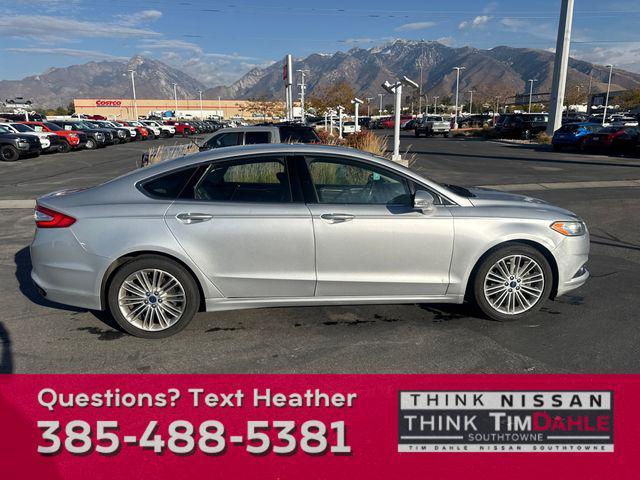 used 2016 Ford Fusion car, priced at $7,998