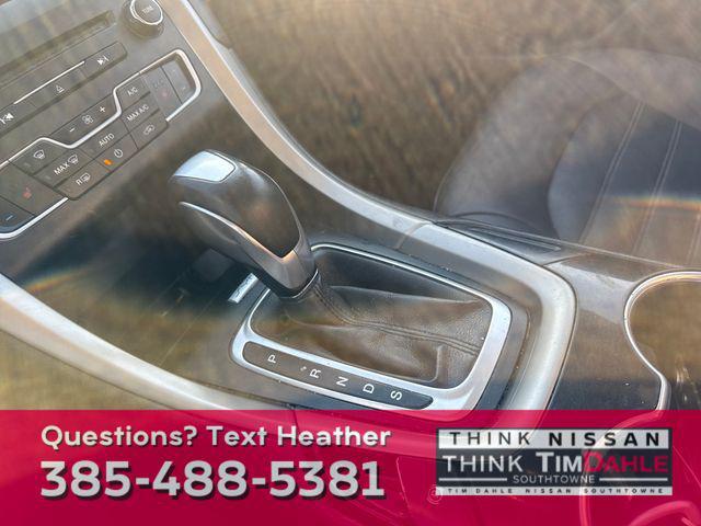 used 2016 Ford Fusion car, priced at $7,998