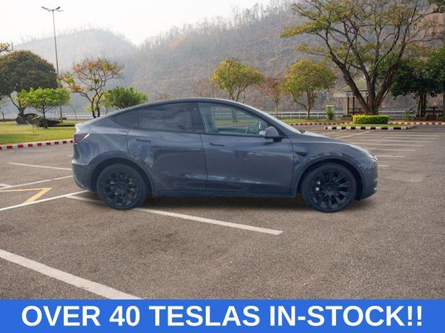 used 2021 Tesla Model Y car, priced at $30,878